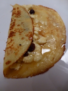 Pancake with caerphilly cheese, raisins and honey